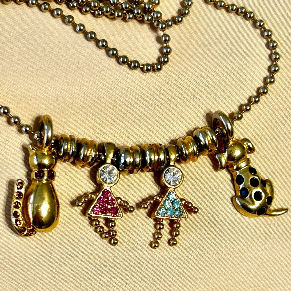 KIS Cat and Dog Charms and two unmarked Girls on Chain